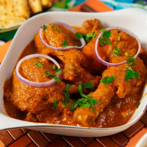 Butter Chicken at New Indian Sweets & Restaurant